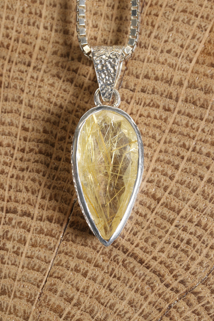 Gold Rutile in Quartz Pendant