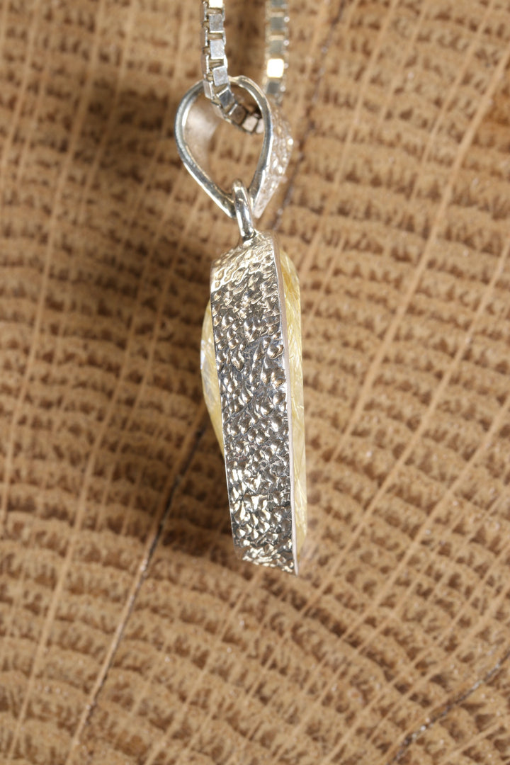 Gold Rutile in Quartz Pendant