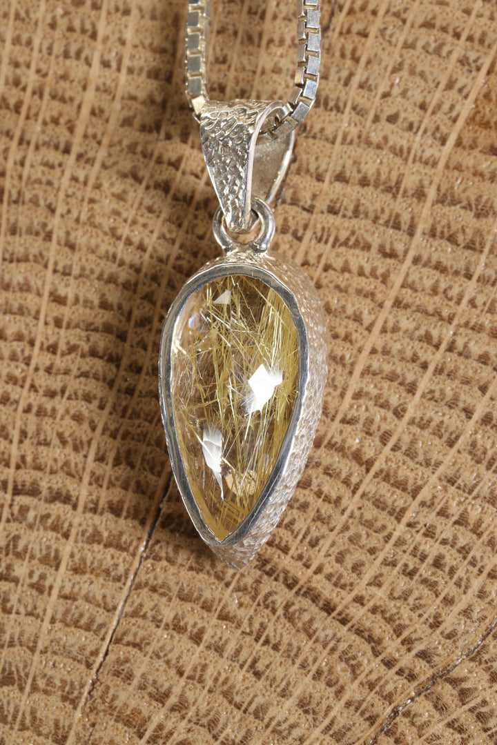 Gold Rutile in Quartz Pendant