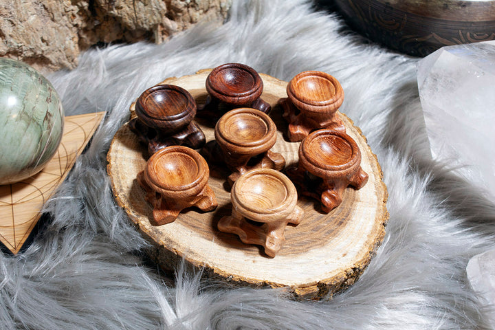hand carved wood sphere stand